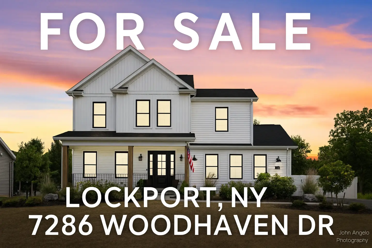 “Twilight exterior photo of modern farmhouse at 7286 Woodhaven Dr, Lockport NY — HDR real estate photography by John Angelo Photography.”